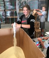 Hanford Christian School students opened thousands of packages of dried potatoes to be used in soup mixes.